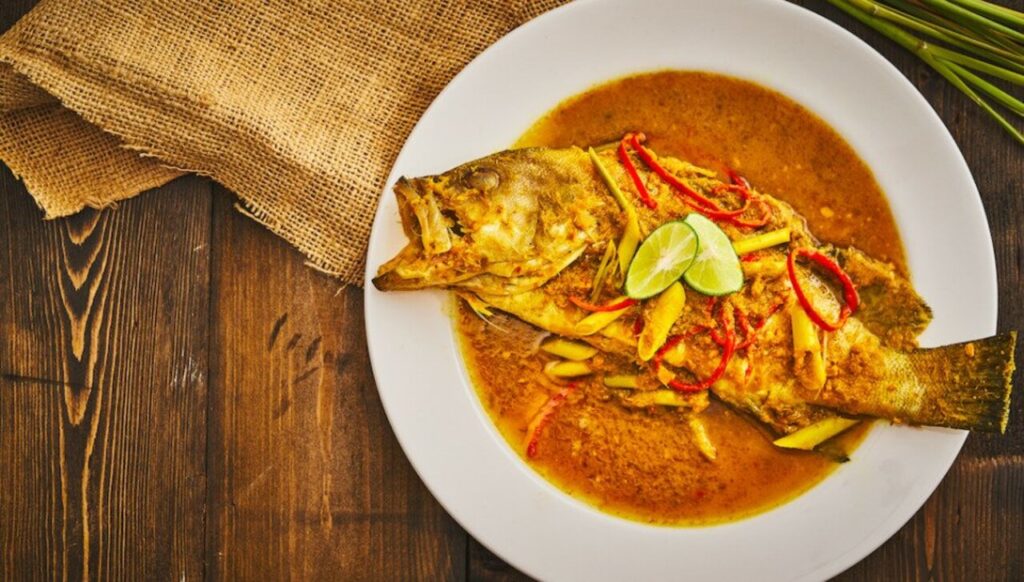 Lezatnya Bikin Nagih! Jelajahi Sulawesi Utara Lewat Ikan Woku Belanga yang Menggoda